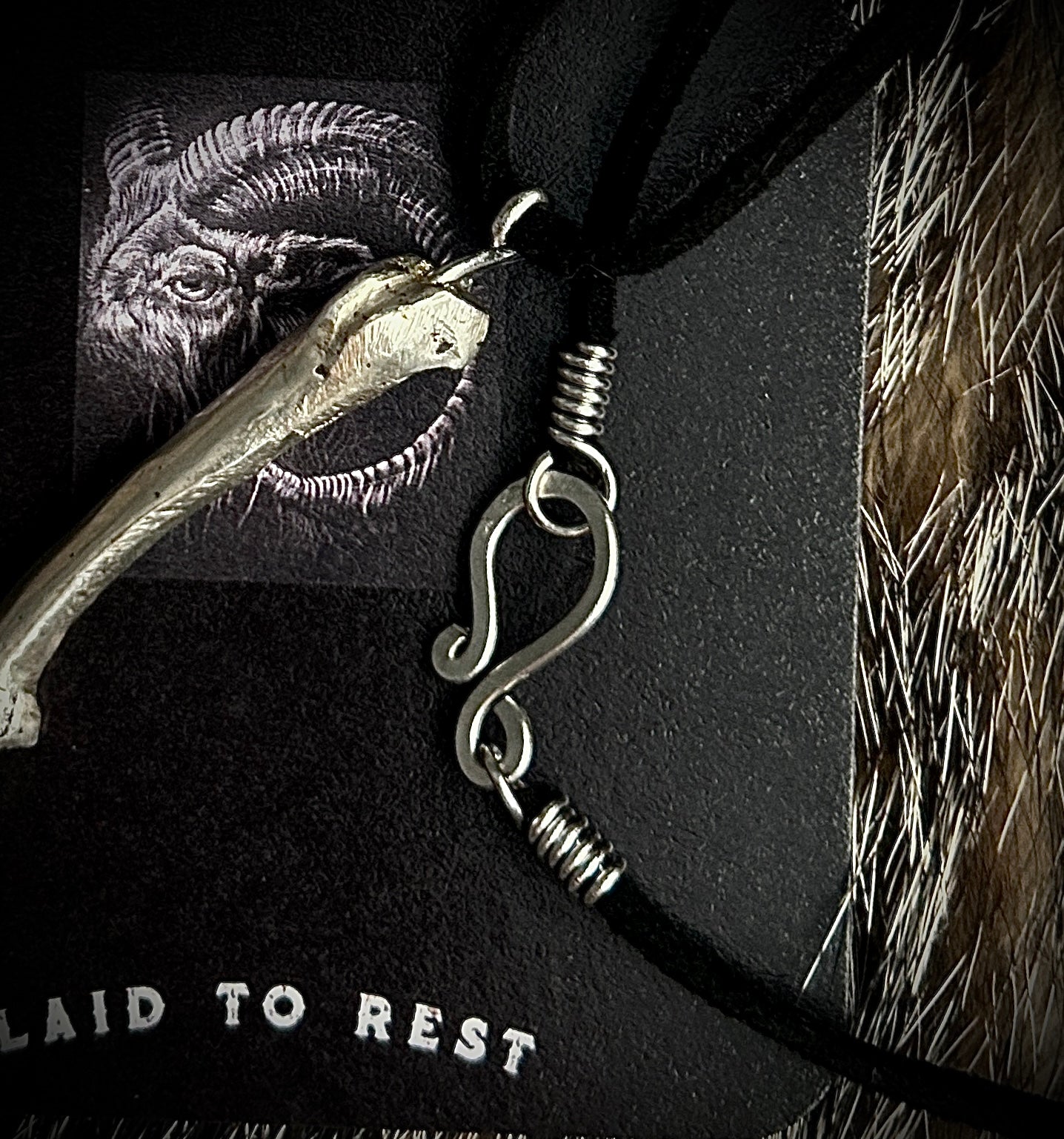 Silver Femur Pendant