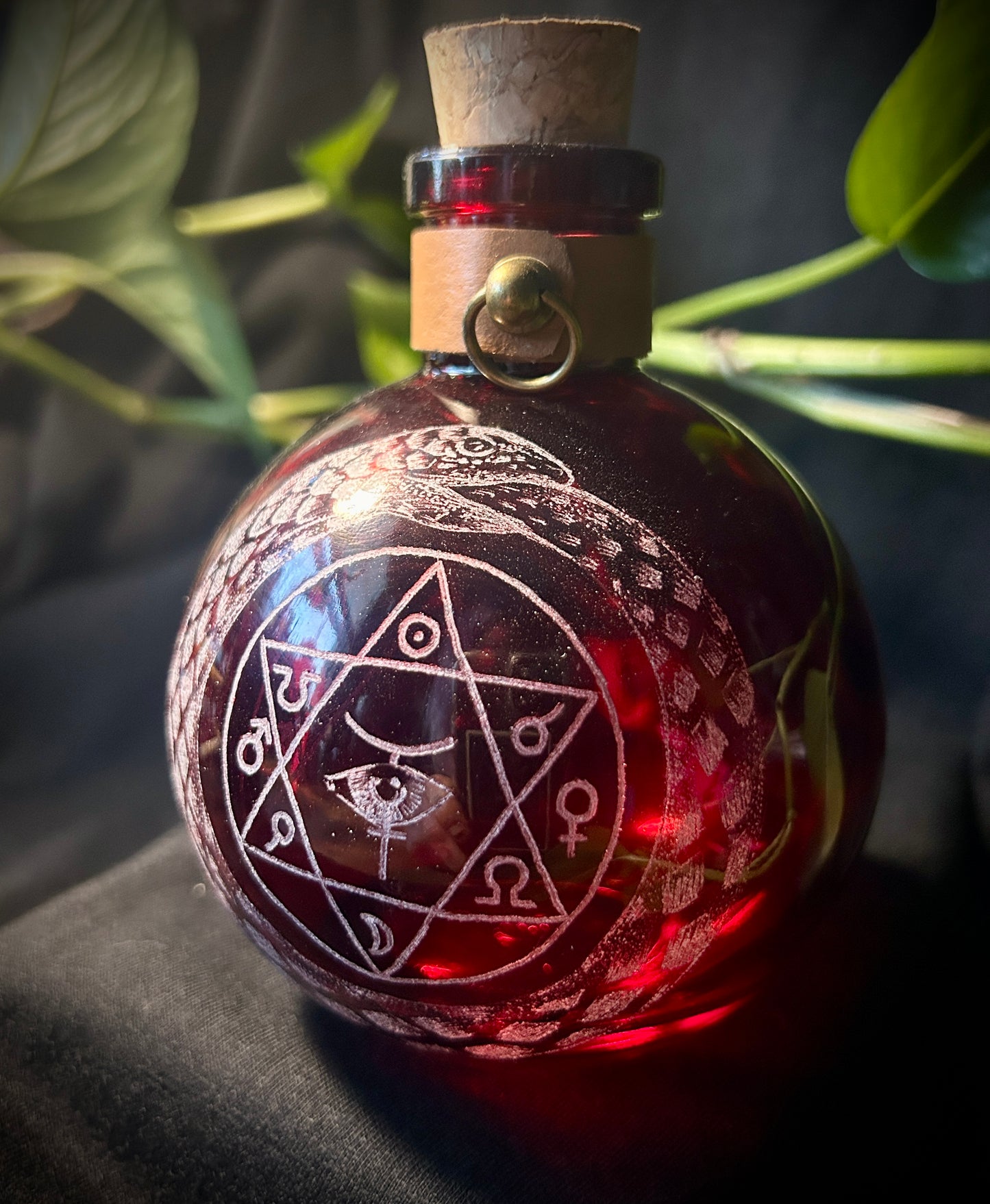 Ouroboros Alchemy hand-etched bottle