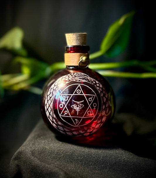Ouroboros Alchemy hand-etched bottle