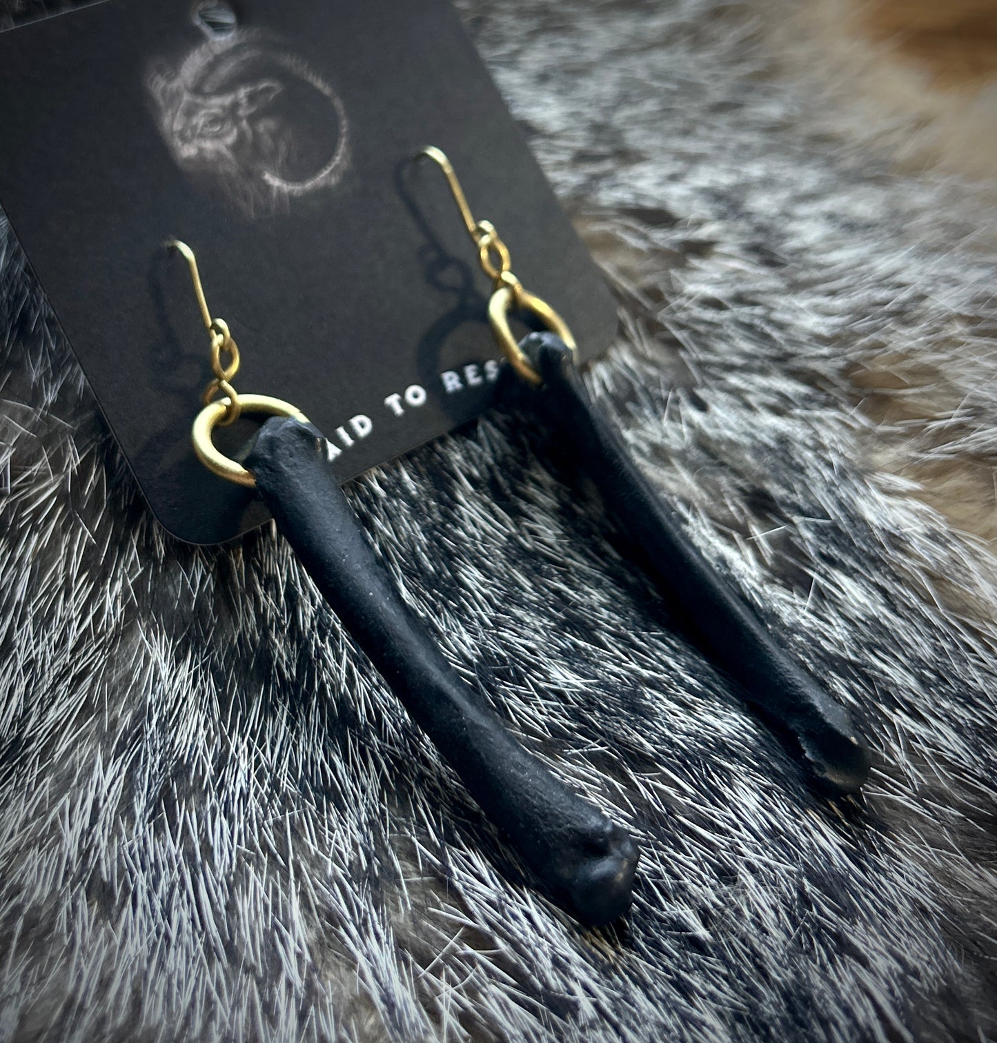 Black Coyote Metacarpal Earrings