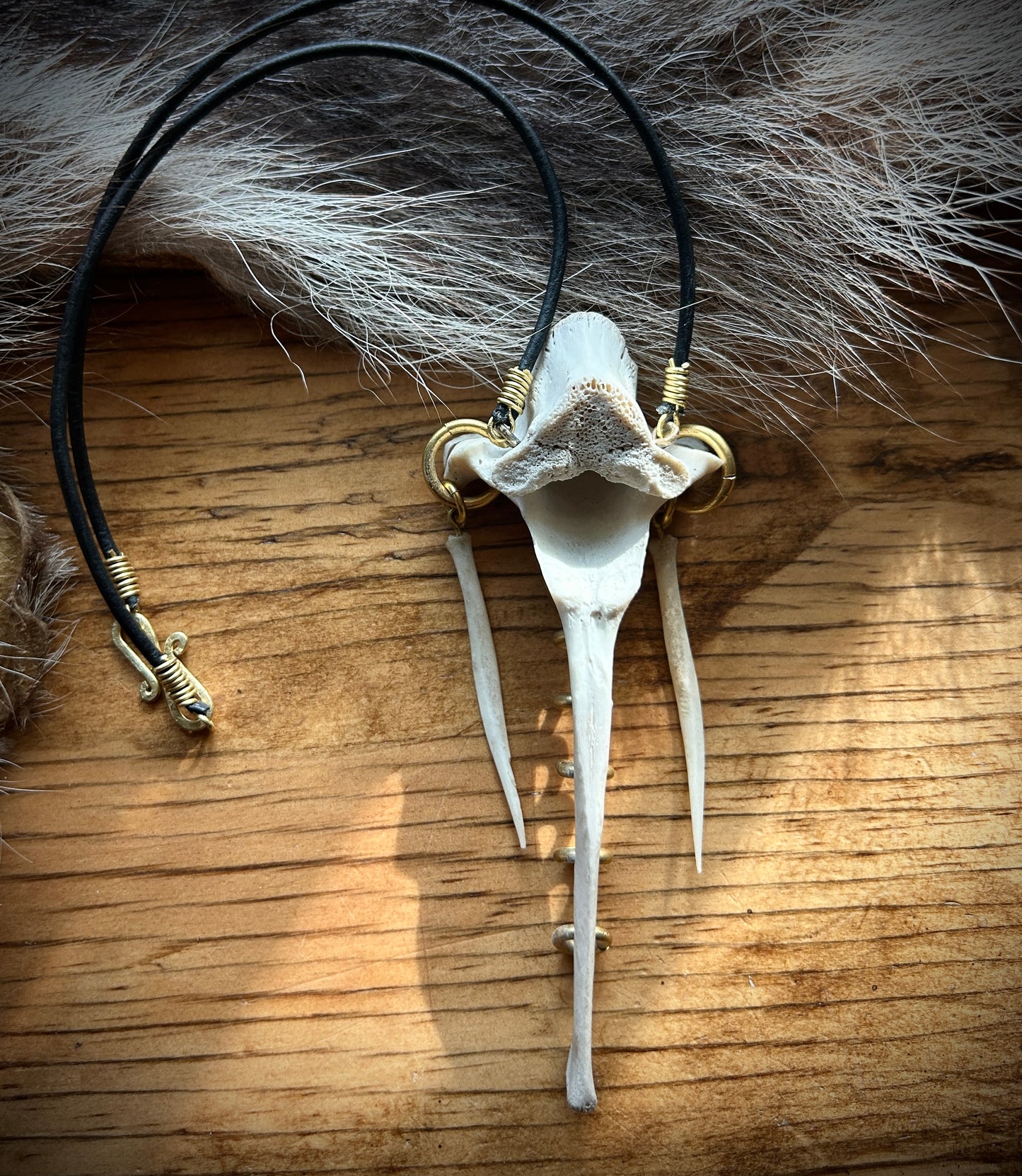 Deer bones pierced vertebrae necklace