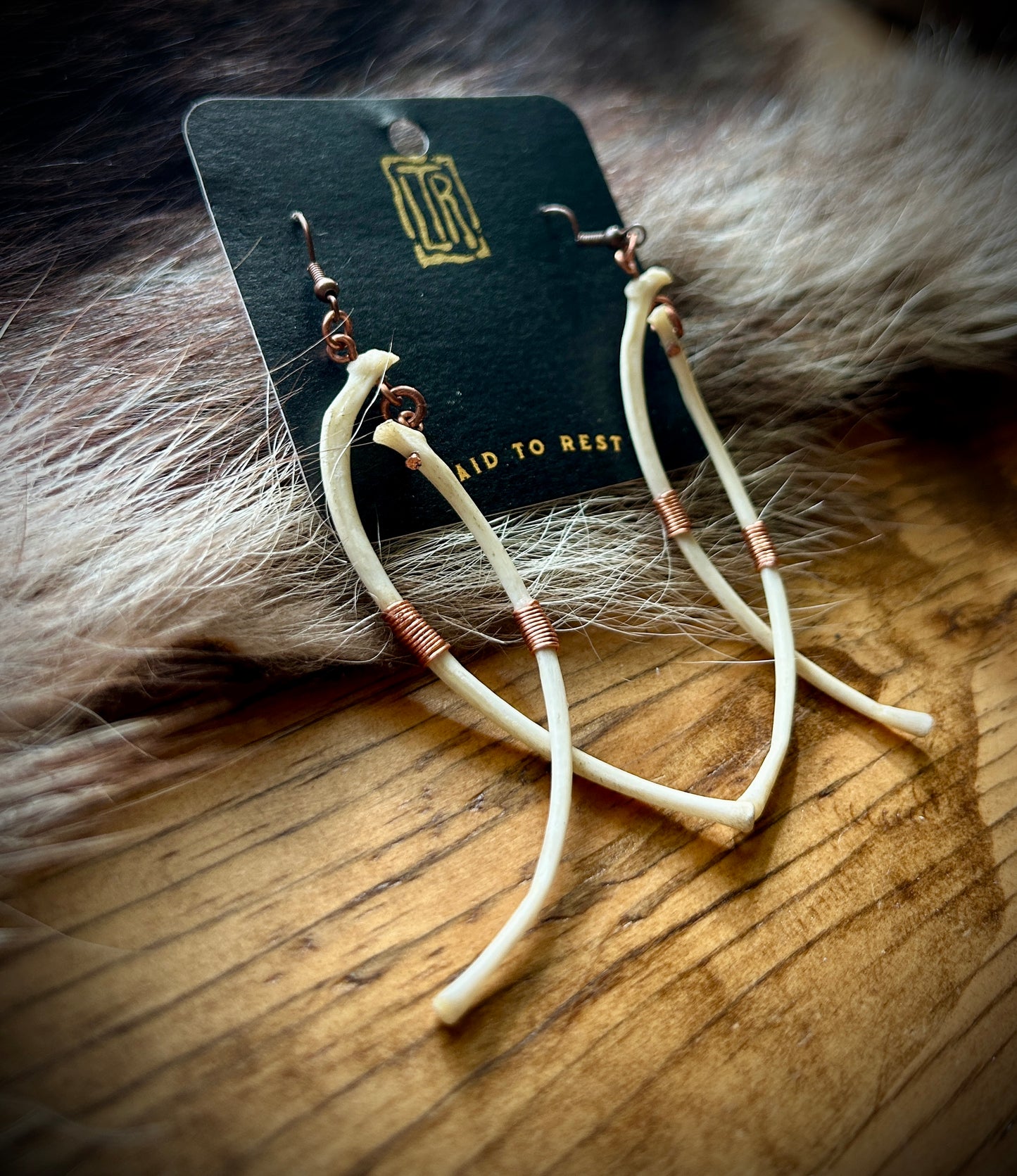 Raccoon Ribs copper wire wrapped earrings