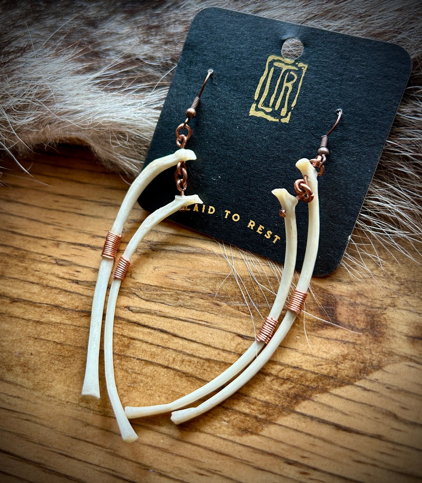 Raccoon Ribs copper wire wrapped earrings